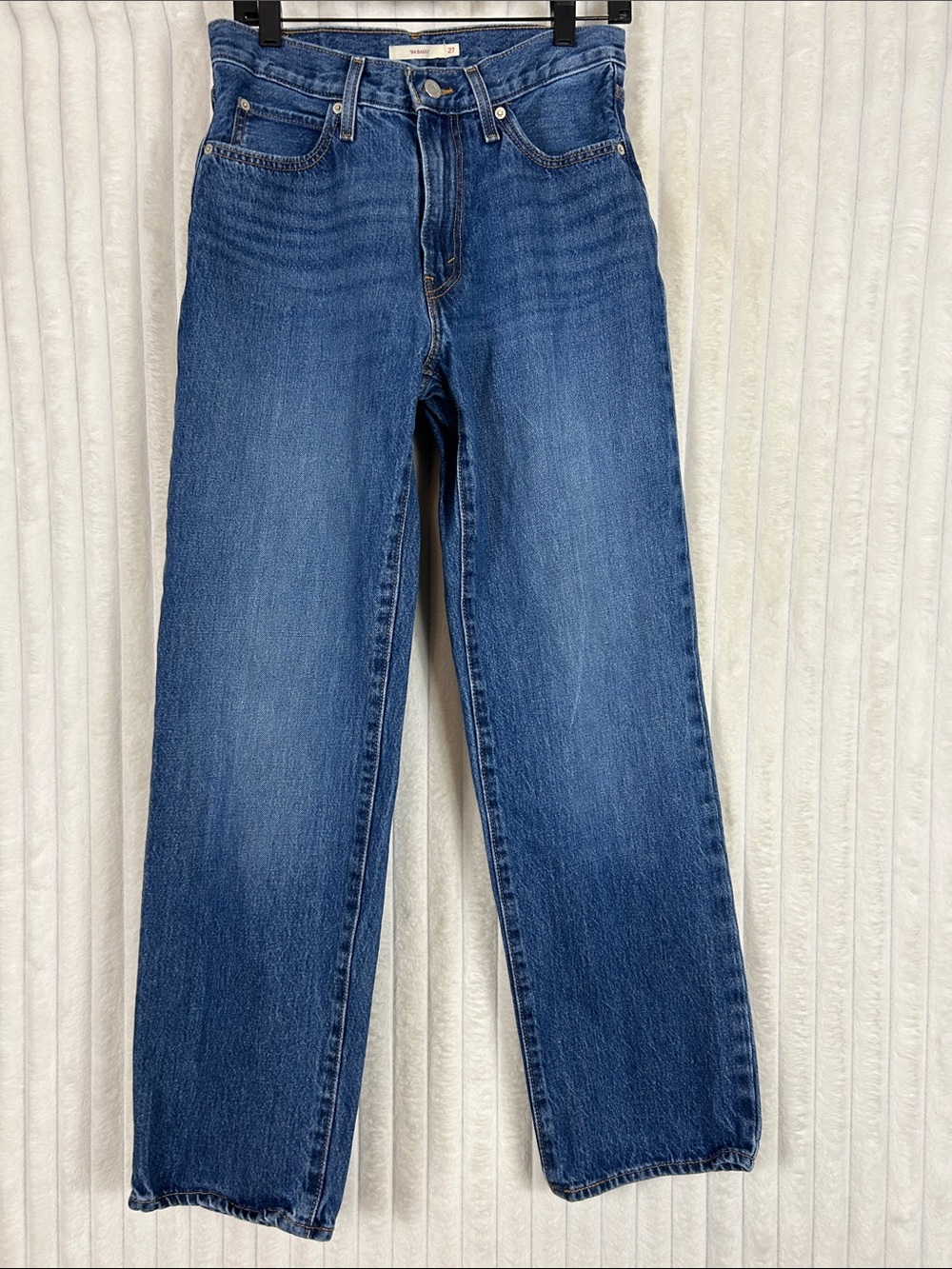 Levi's 94 Baggy jeans featuring a medium wash size 27